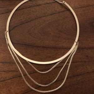 Gold multi layer necklace.